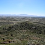View south-east from the peak of Mexican Hat hill towards Little Hat hill
